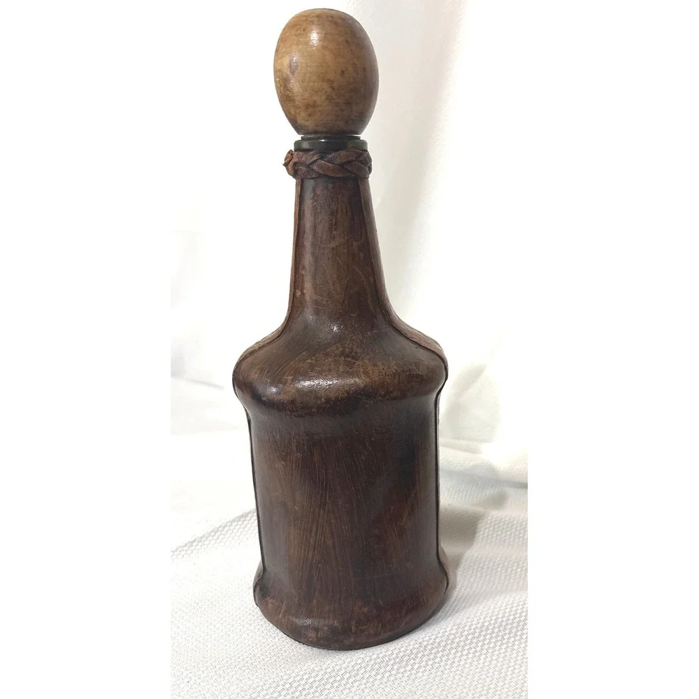 Vintage Leather Wrapped Decanter Bottle Embossed Coat of Arms Crest Wood Stopper